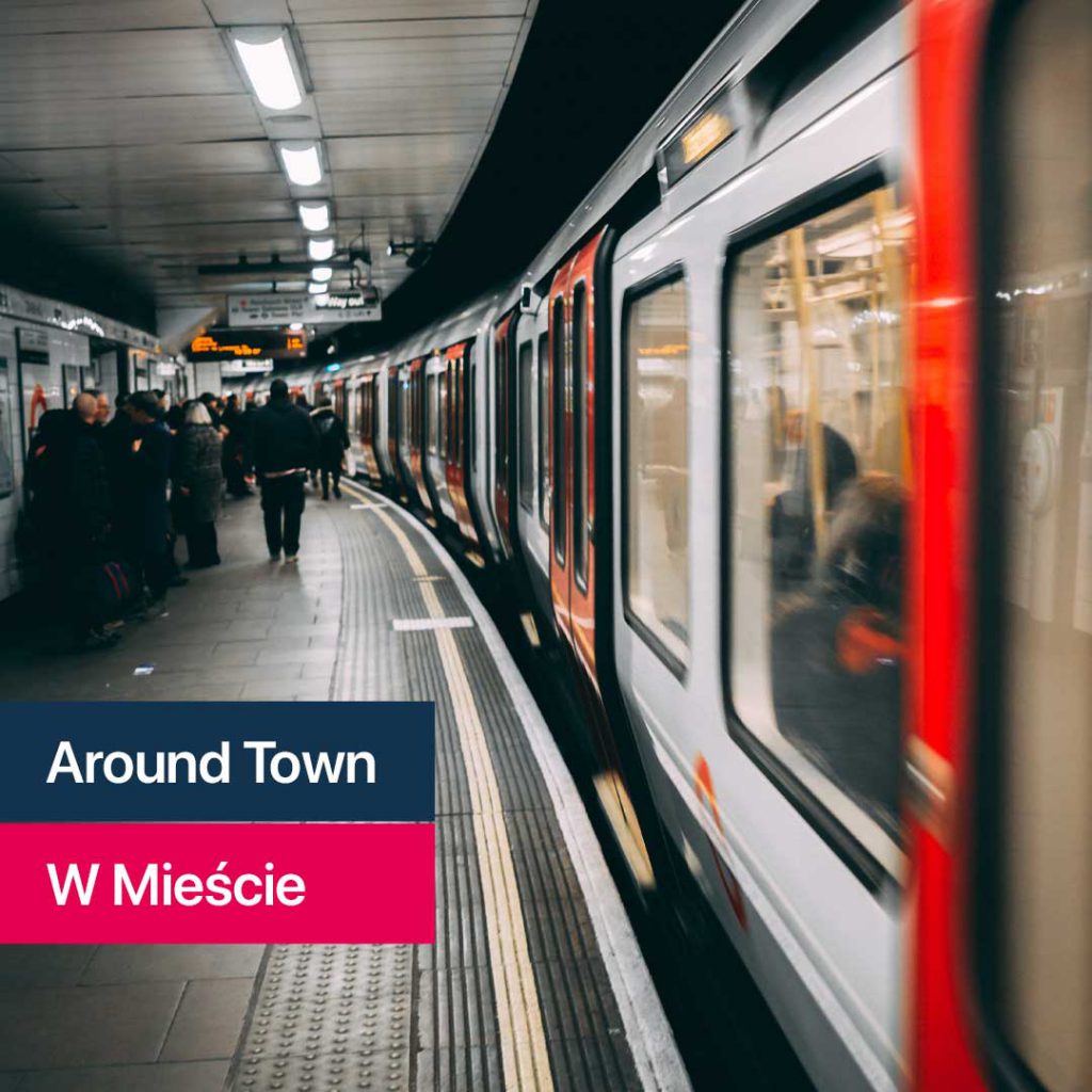 Tube train and busy station