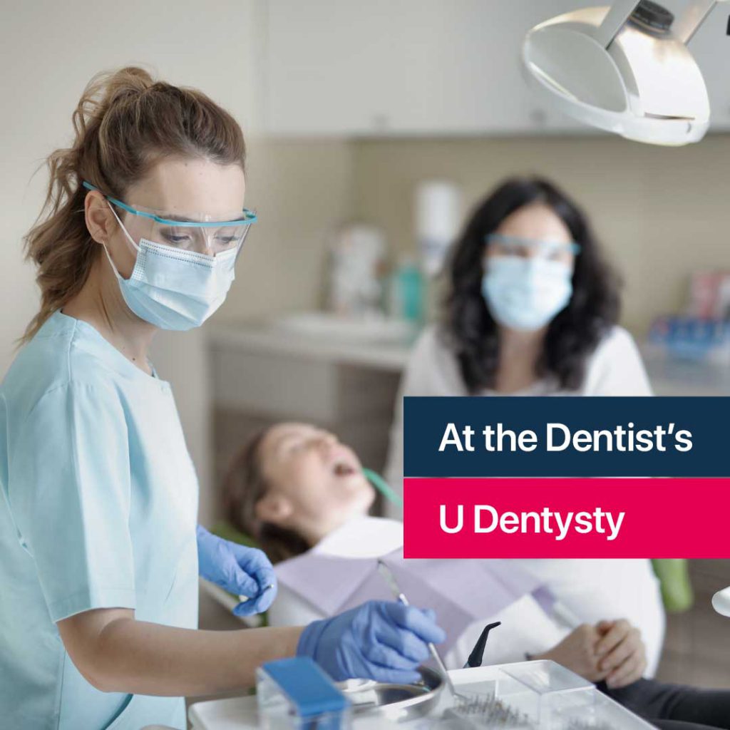 Dentist working in a patient